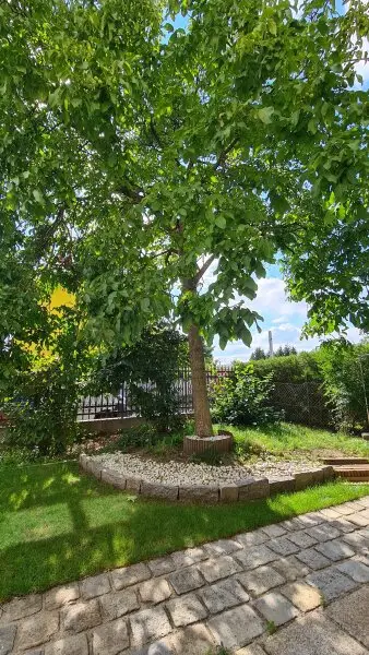 Sehr ruhige Siedlungslage - Gartenwohnung mit Garage in sehr gepflegten Haus