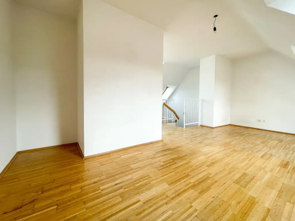 DG-Maisonette mit Terrasse – Wohnen auf zwei Ebenen in ruhiger Stadtlage mit Weitblick
