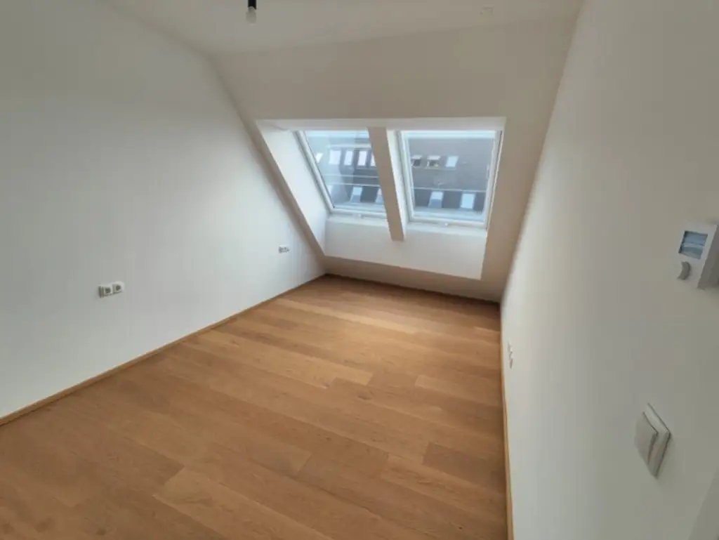Modern wohnen in Meidling! DG-3-Zimmer-Erstbezug mit Terrasse - Top72