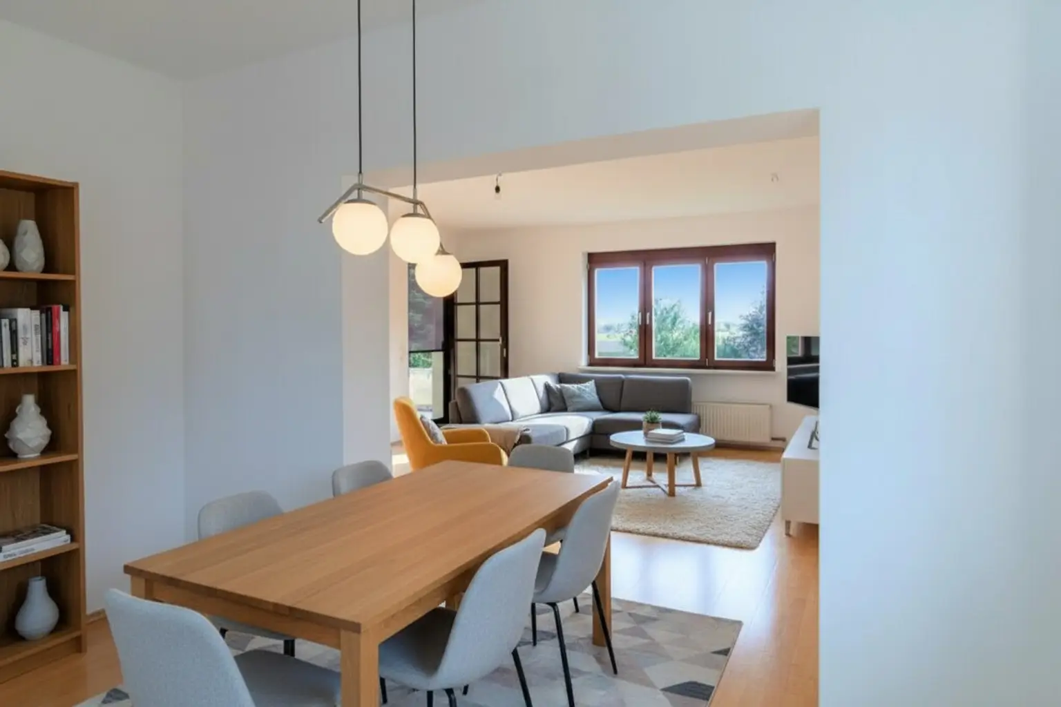 Essbereich mit Blick zum Wohnbereich: KI generiert