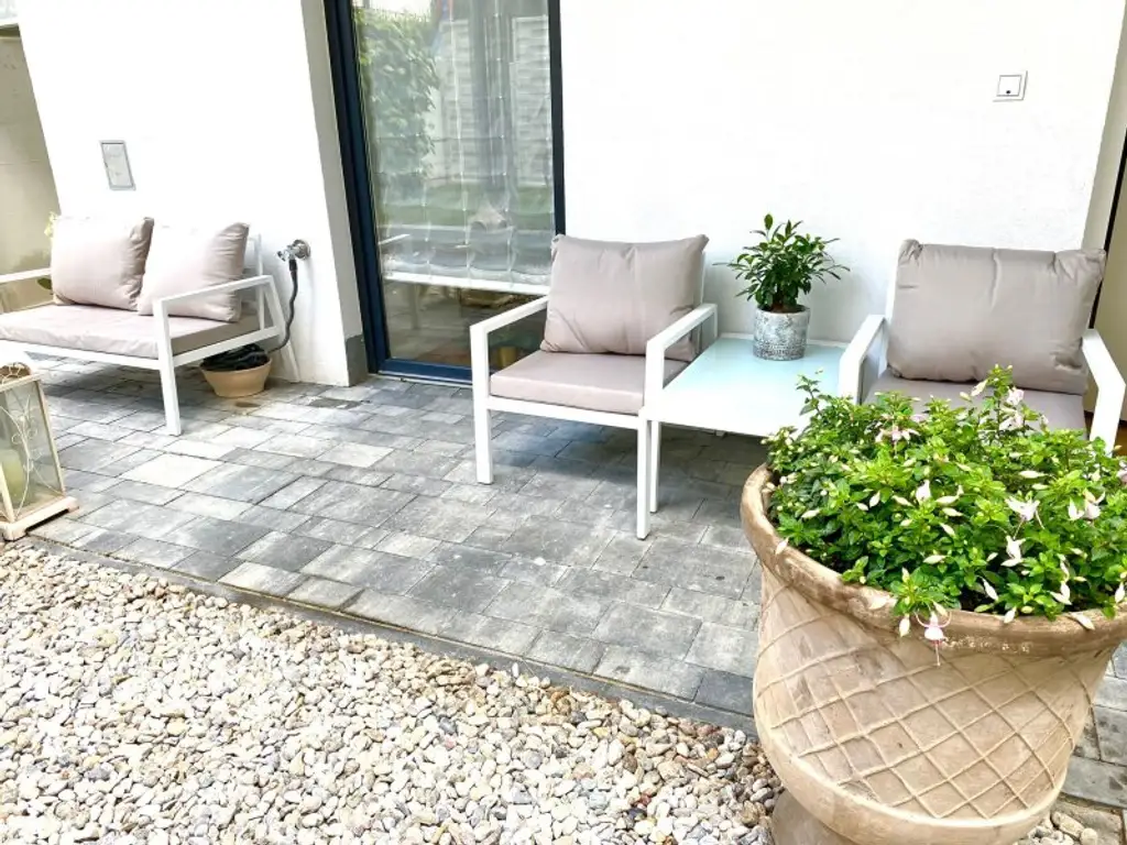Schöne 3 Zimmermaisonettwohnung mit Garten in guter Lage