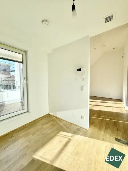 Charmante 2-Zimmer-Dachgeschosswohnung mit Süd-Terrasse und Kühlung nähe Arenbergpark