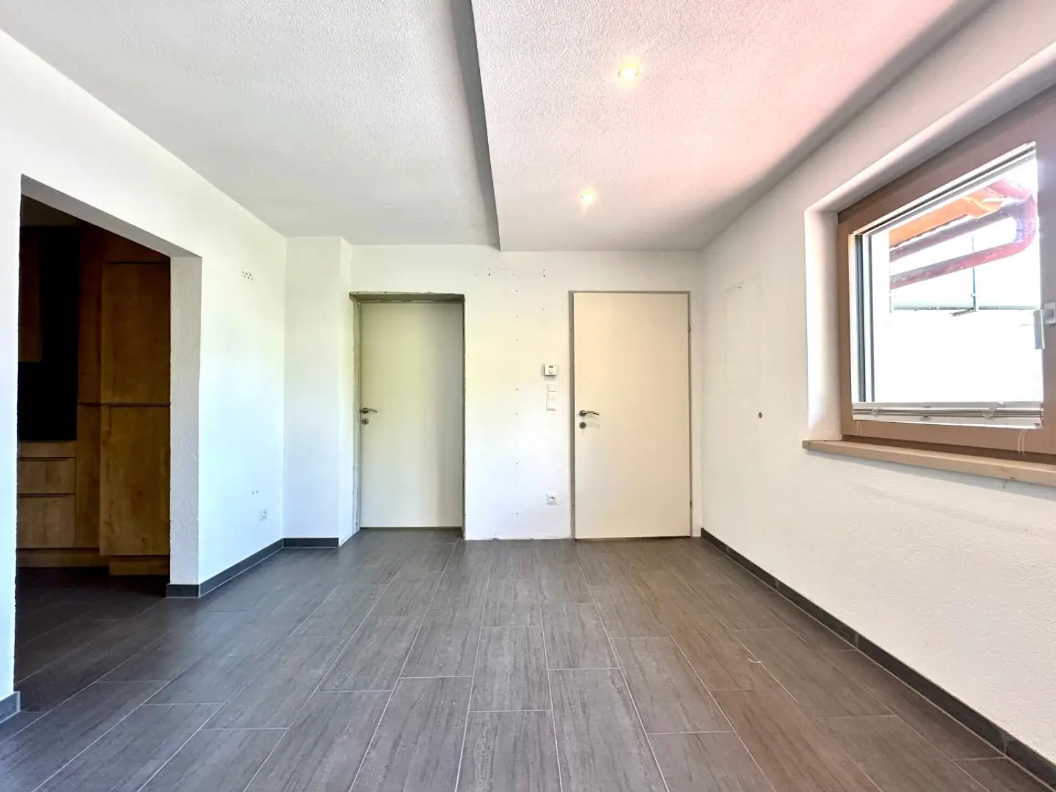 Perfekte Starterwohnung mit Garten und einem Parkplatz