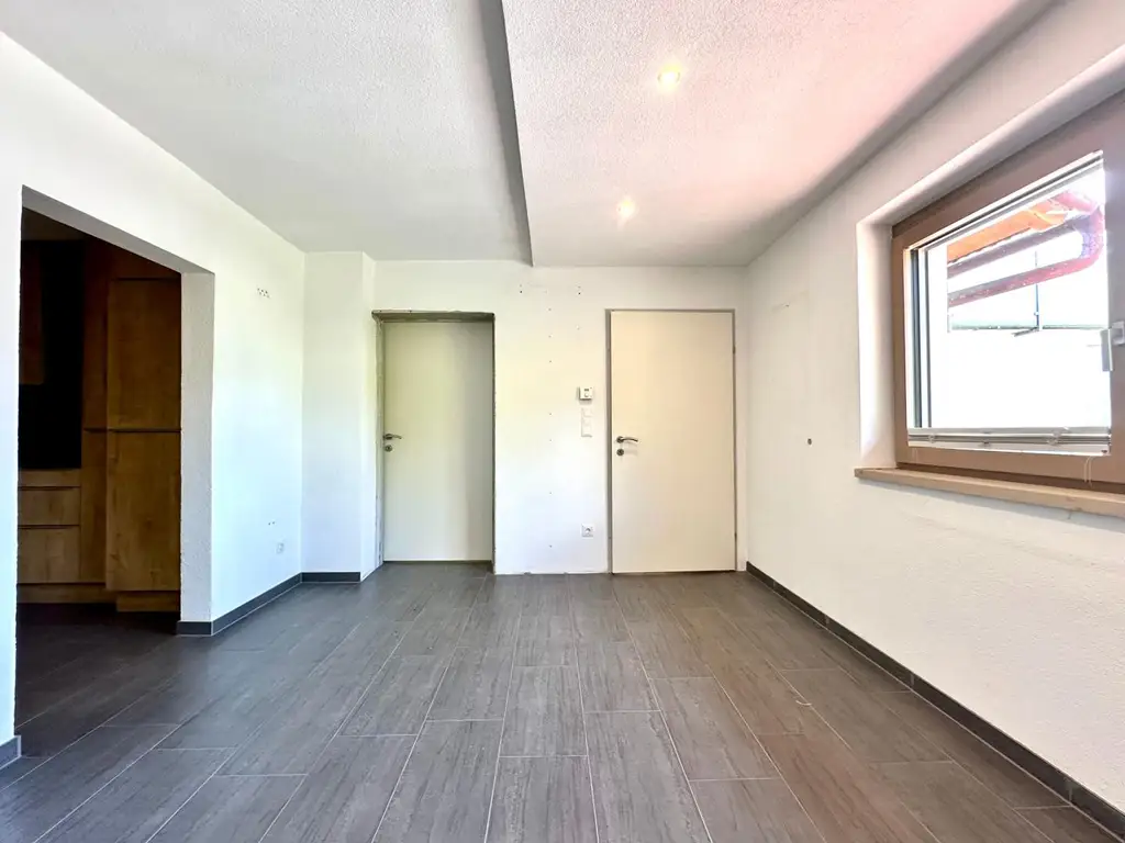 Perfekte Starterwohnung mit Garten und einem Parkplatz