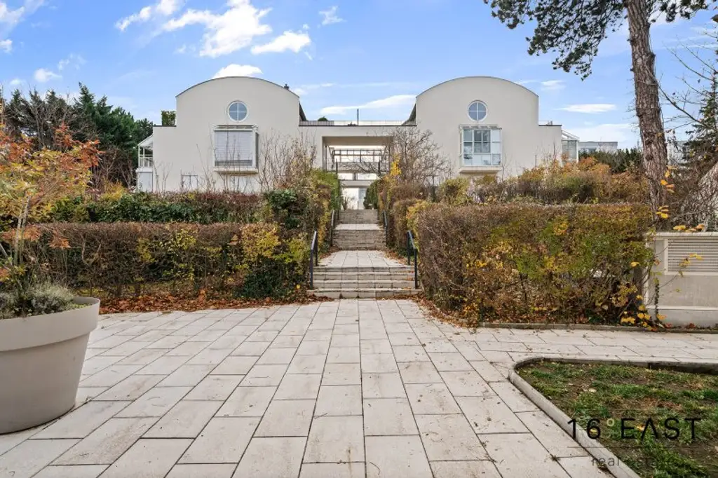 Exklusive 5-Zimmer Garten-Maisonette in Grünruhelage mit Fernblick und Garage