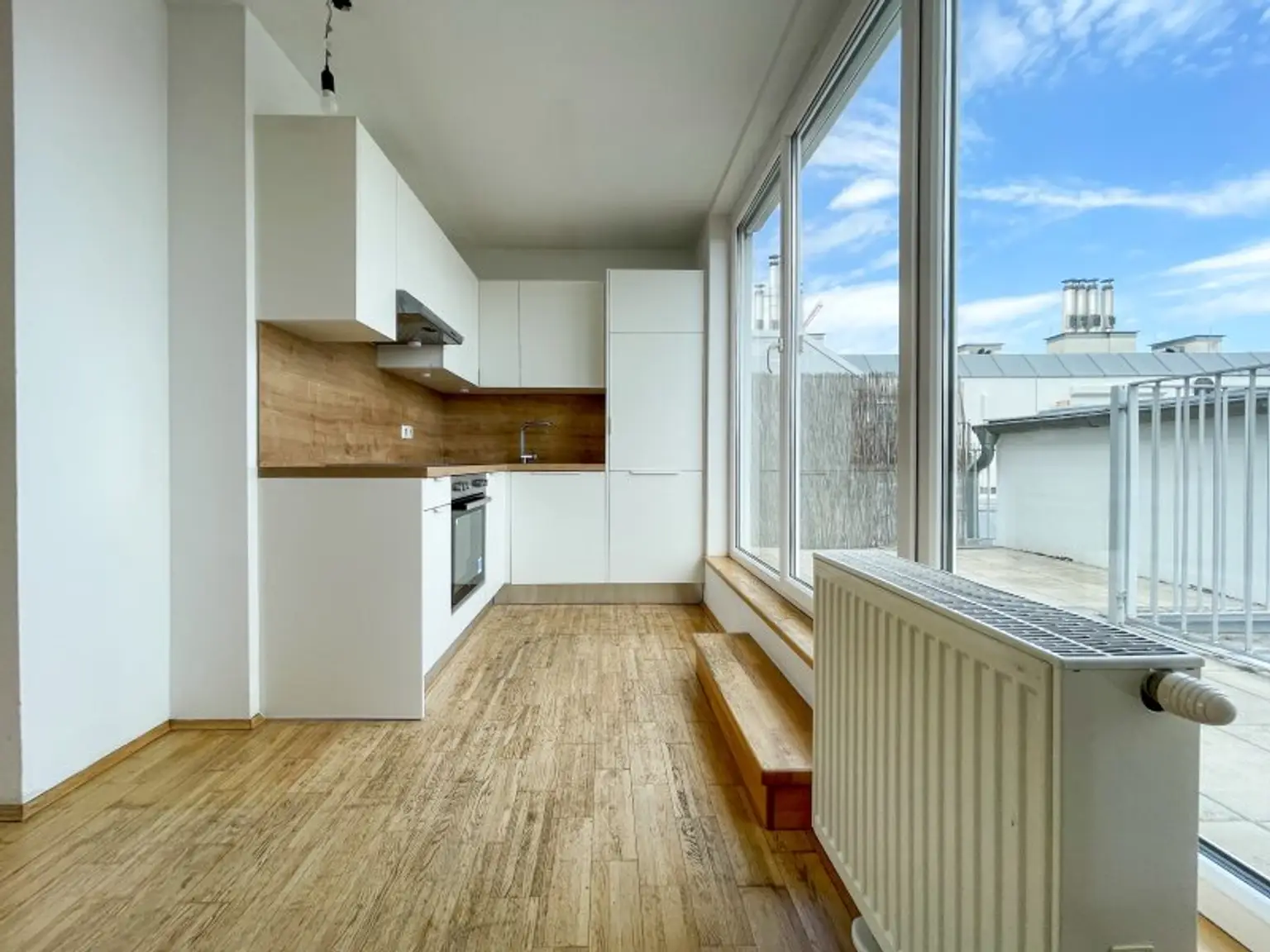 DG-Maisonette mit Terrasse – Wohnen auf zwei Ebenen in ruhiger Stadtlage mit Weitblick