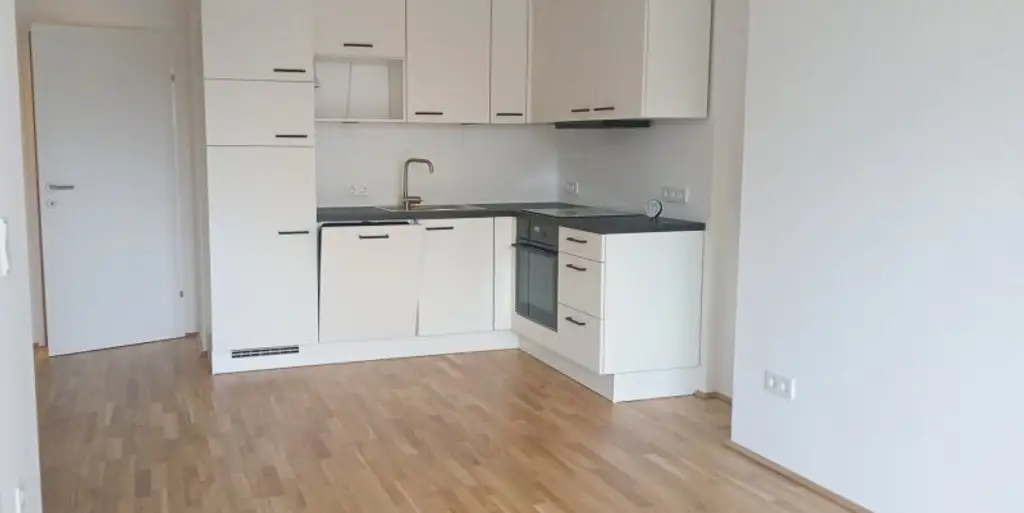 NEUBAU - ERSTBEZUG - Top 18 - Wunderschöne 2 Zimmerwohnung mit großem Balkon und eigenem Tiefgaragenplatz