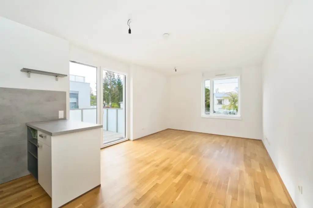 Sonnige 3-Zimmer-Eigentumswohnung mit Südterrasse & Garage – ruhig, grün & citynah an der renaturierten Liesing