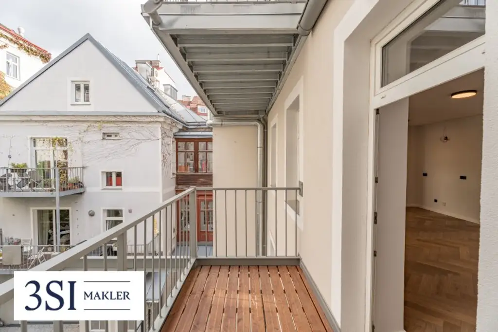 Stilvoll wohnen mit Grünblick – sanierter 2-Zimmer-Altbau mit Balkon in ruhiger Lage
