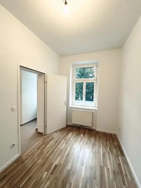 Freundliche und effiziente 3-Zimmerwohnung in schön saniertem Haus