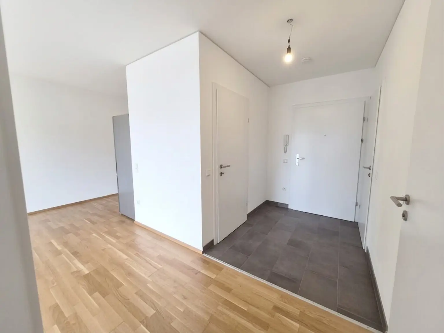 Neubau: Besonders ansprechende 54 m² 2-Zimmerwohnung mit 28 m² Garten