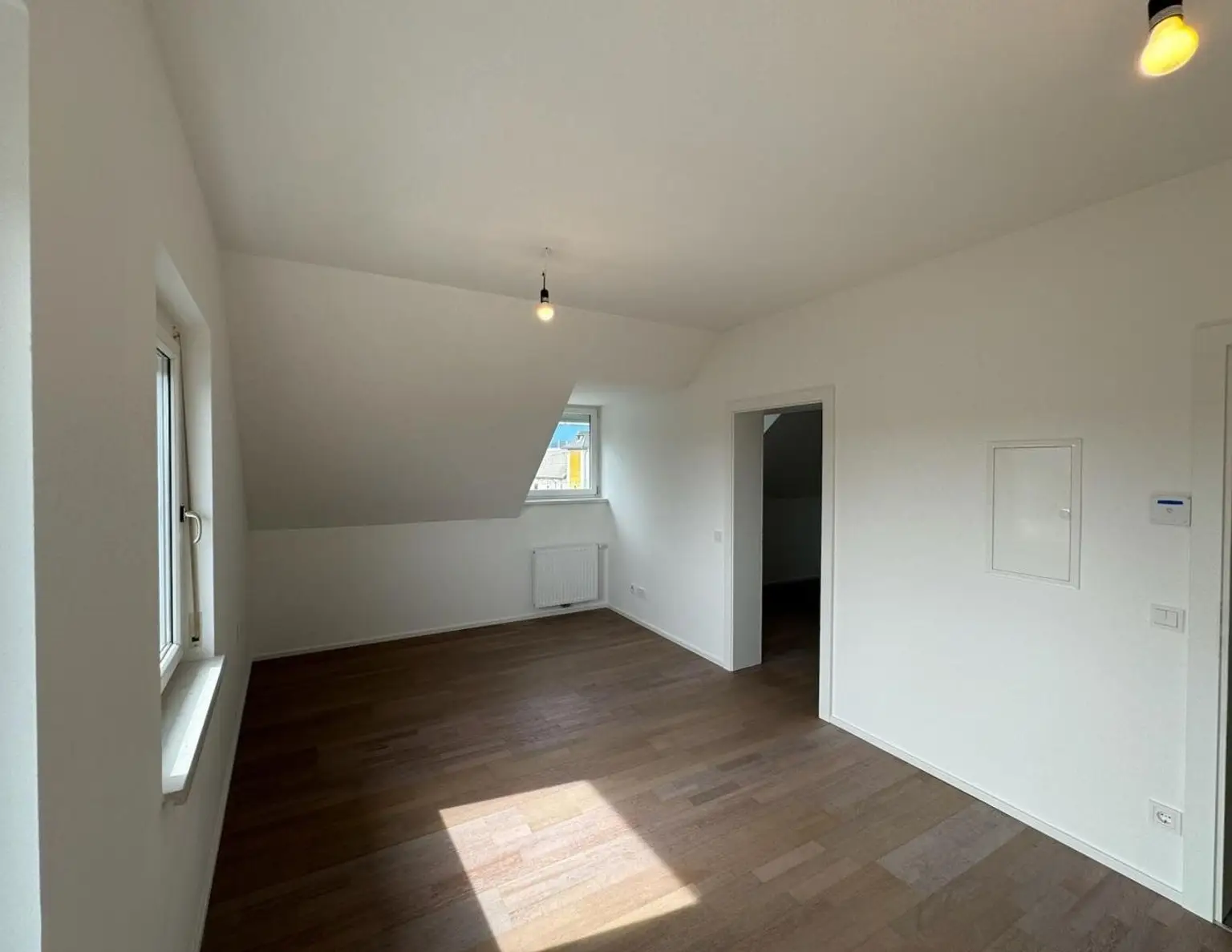 Top 2 - Gemütliche 2-Zimmer-Dachgeschosswohnung mit Blick auf den Grünberg und Traunstein