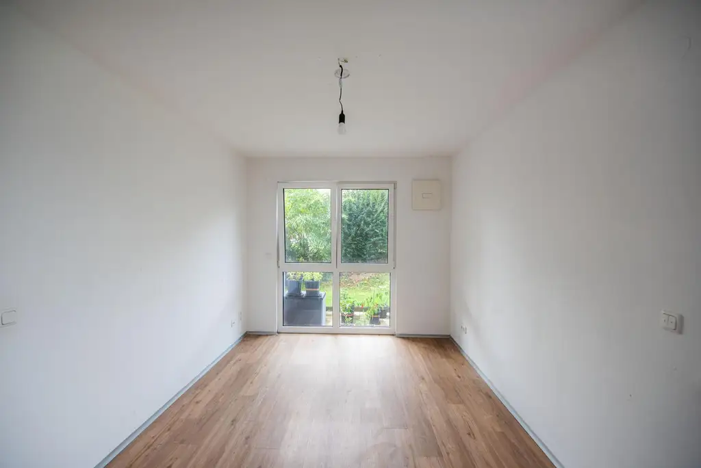 Erdgeschosswohnung mit kleinem Garten