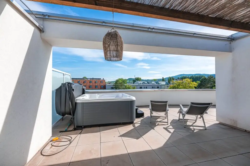 Traumwohnung mit 50 m² Dachterrasse, E-Ladestation und Topausstattung