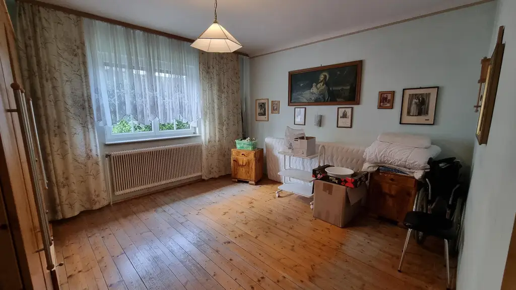 Vielseitiges Mehrfamilienhaus mit Charme und einladendem Garten