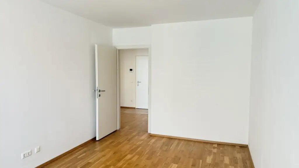 Eugen-Bormann-Gasse: 2-Zimmer-Neubau mit Terrasse mit opt. Garagenstellplatz!
