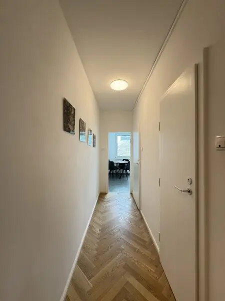 Eleganz am Schwedenplatz – Maßgeschneiderter Wohntraum mit Blick auf die Stadt