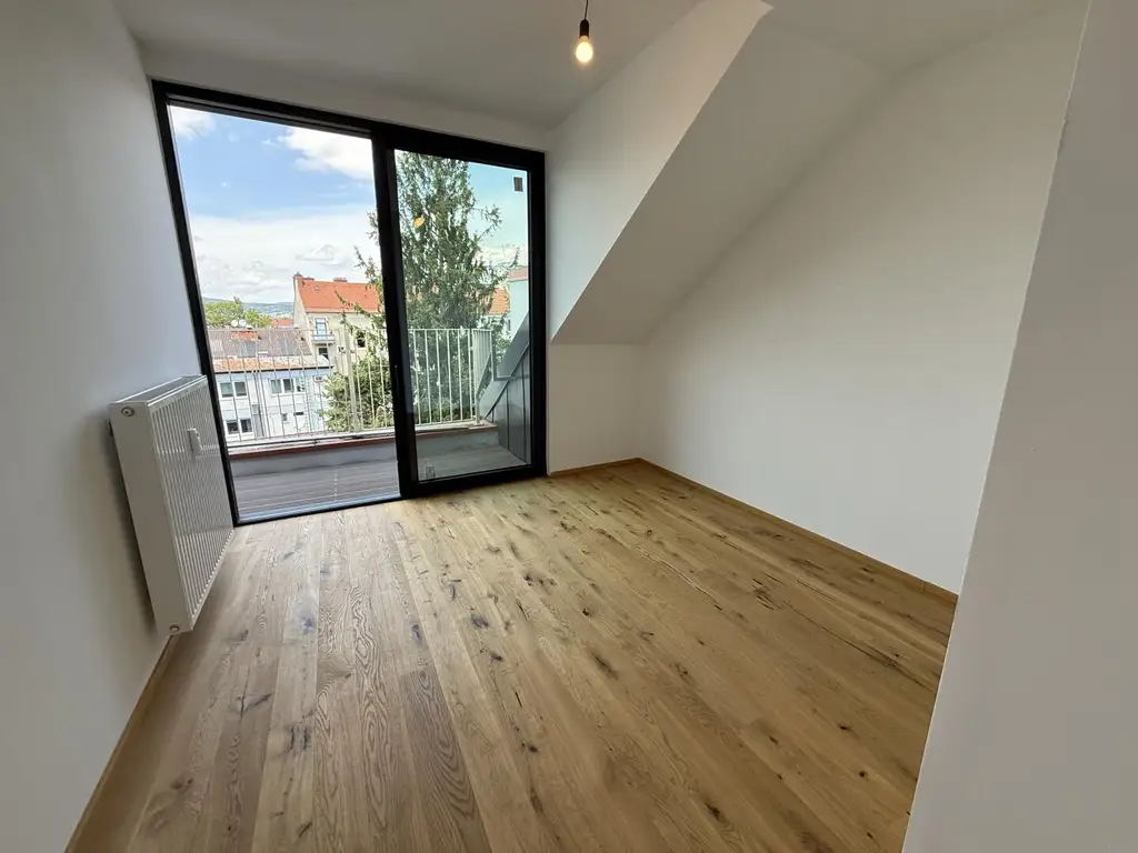 Erstbezug: Moderne Dachgeschosswohnung mit Balkon und Lift in begehrter Lage nahe dem Lendplatz K6/11