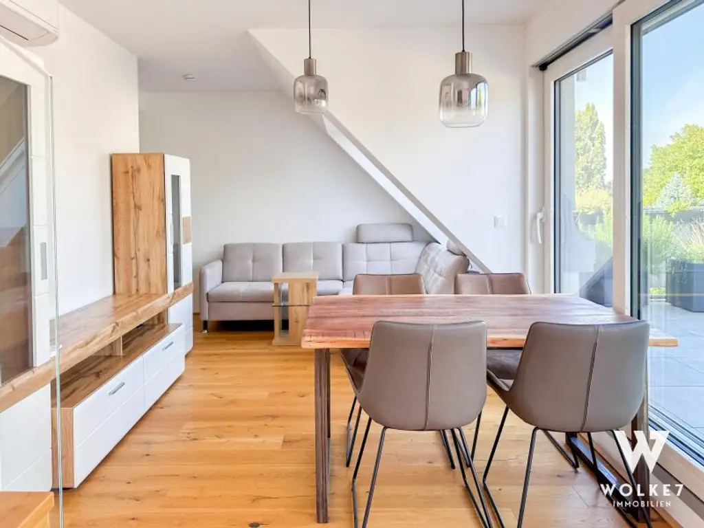 Exklusive 3-Zimmer-Dachgeschoss-Maisonette mit der Terrasse und Tiefgaragenplatz