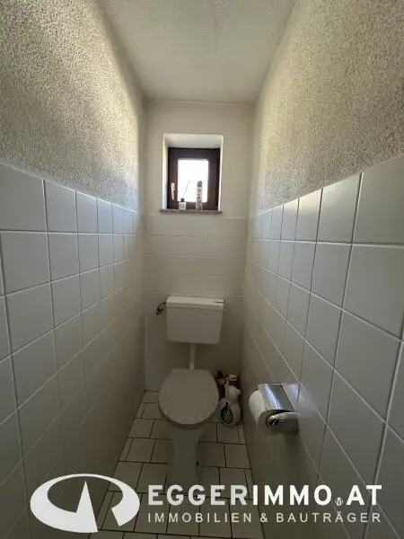 Niedernsill - Spacious 4-Room Apartment with Garden & Balcony for Sale in a Two-Party House