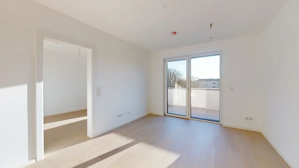 2-Zimmer-Erstbezug mit Innenhof-Balkon – Anleger oder Eigennutzer