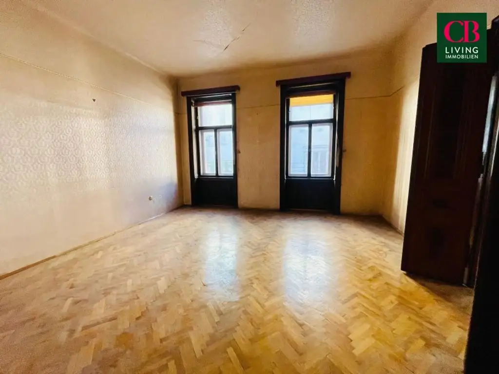 SANIERUNGSBEDÜRFTIGE WOHNUNG IM REPRÄSENTATIVEN JAHRHUNDERTWENDEHAUS