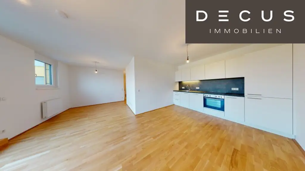+ RICHTUNG WESTEN + ZWEI ZIMMER + 19 QM GROSSE TERRASSE + 6. STOCK + NIEDRIGENERGIEHAUS + NAHE THERESA-TAUSCHER-PARK
