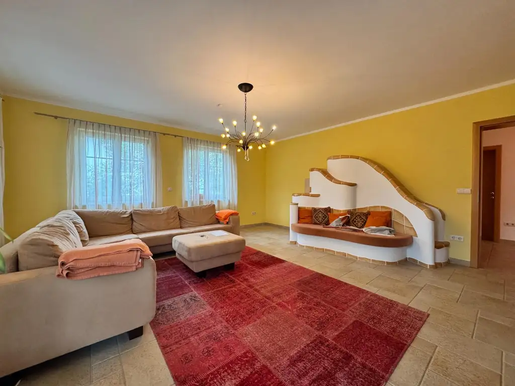 XXL Traum Bungalow mit Kachelofen überdachter Terrasse, Gartenoase, Wohnkeller und Doppelgarage  im Laahfeld /Ansfelden