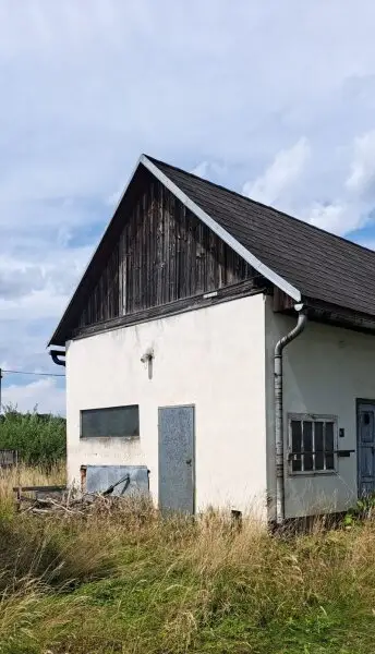 Sanierungsbedürftiges Haus mit Garage und Grünblick in Deutsch Goritz – Ihr neues Projekt!