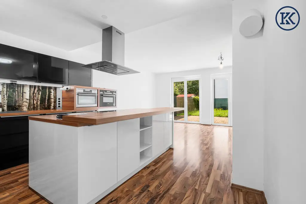 Zuhause im Grünen – Lichtdurchflutete Wohnung mit Dachterrasse & Gartenoase