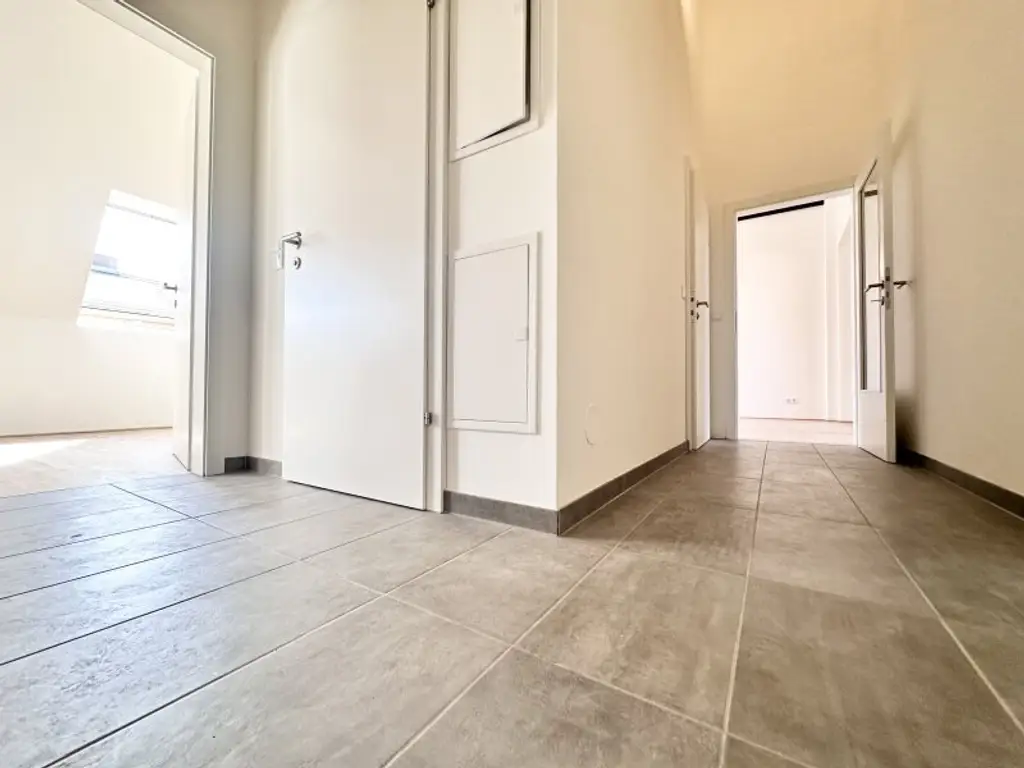 TOP Sanierte Wohnung im Dachgeschoss - Mit Schlossbergaussicht