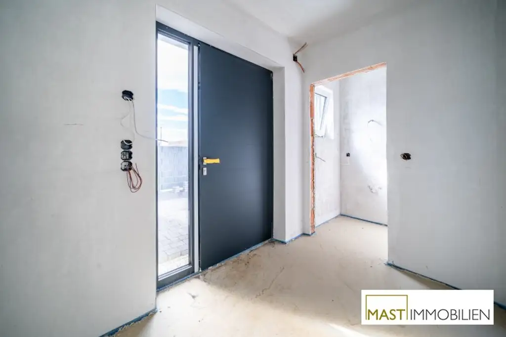ERSTBEZUG - Modernes Einfamilienhaus mit 148 m² Wohnfläche, Balkon, Terrasse & 2 PKW-Stellplätzen in Strasshof – belagsfertig!
