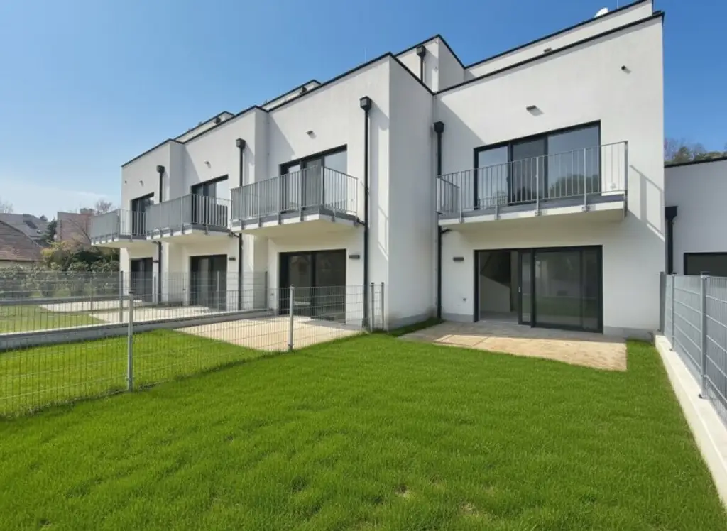 LEBENSQUALITÄT MIT AUSSICHT - EXKLUSIVES TOWNHAUS AUF EIGENGRUND IN WEIDLING – NATURNAHES WOHNEN MIT STIL