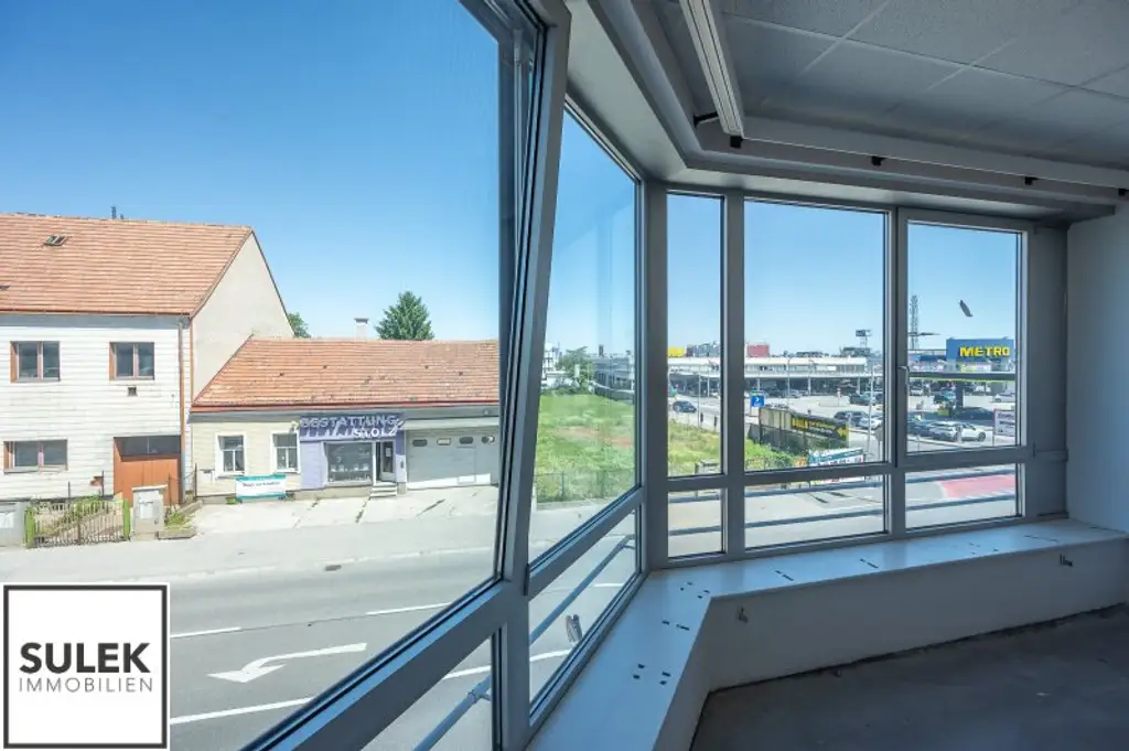 Grundstück mit vier Baukörpern - Büro-, Geschäfts- und Gewerbegebäude inkl. Parkplätzen in Vösendorf