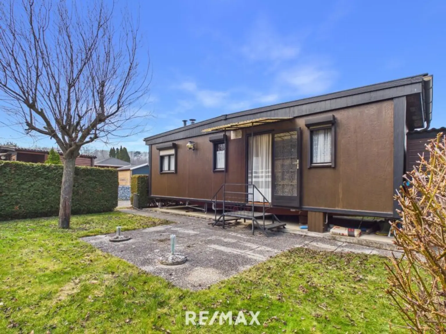 Mobilheim Garten Ansicht 1