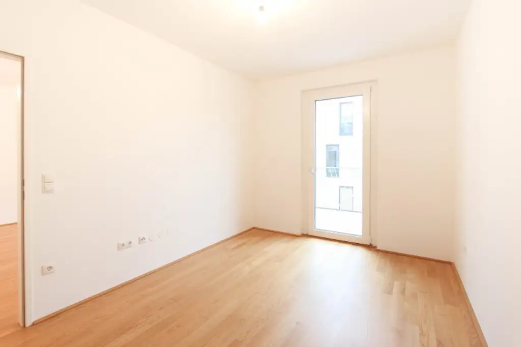Sonnige Wohnung mit Blick ins Grüne, Balkon und Garage!