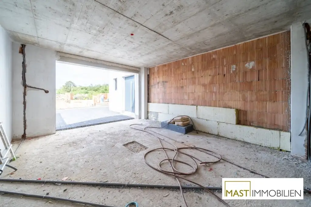 ERSTBEZUG - Modernes Einfamilienhaus mit 148 m² Wohnfläche, Balkon, Terrasse & 2 PKW-Stellplätzen in Strasshof – belagsfertig!
