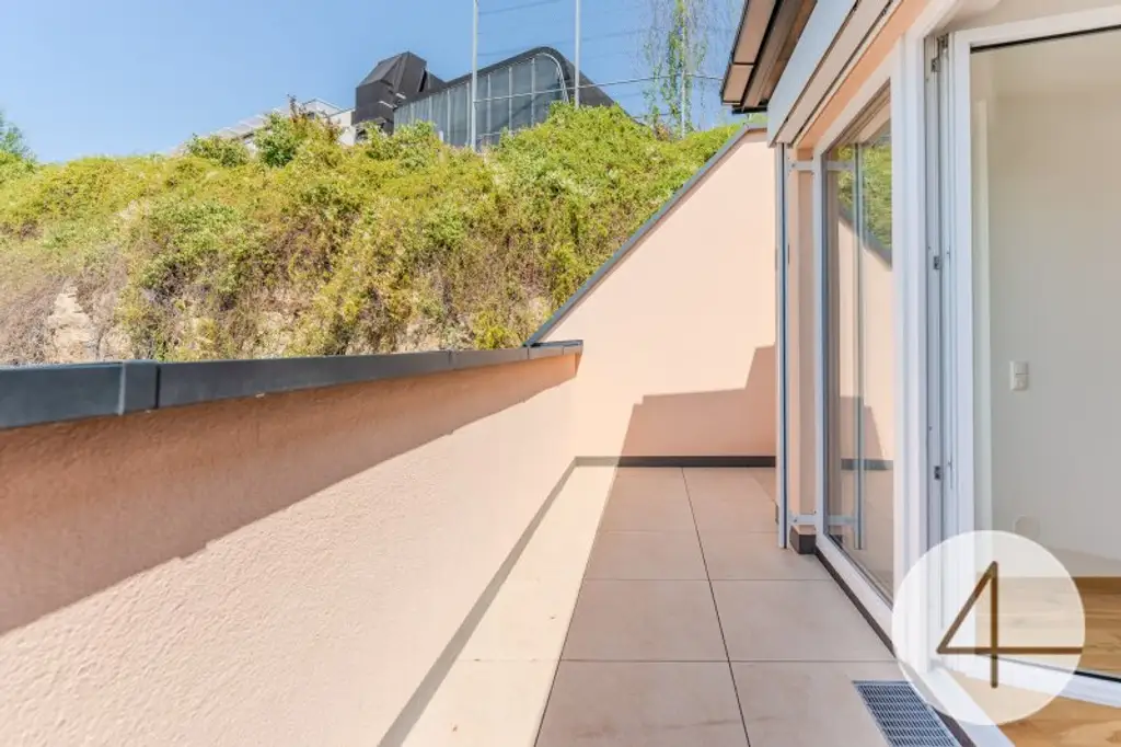 Moderne Neubau-Etagenwohnung mit Dachterrasse – befristet vermietet bis 31.01.2030