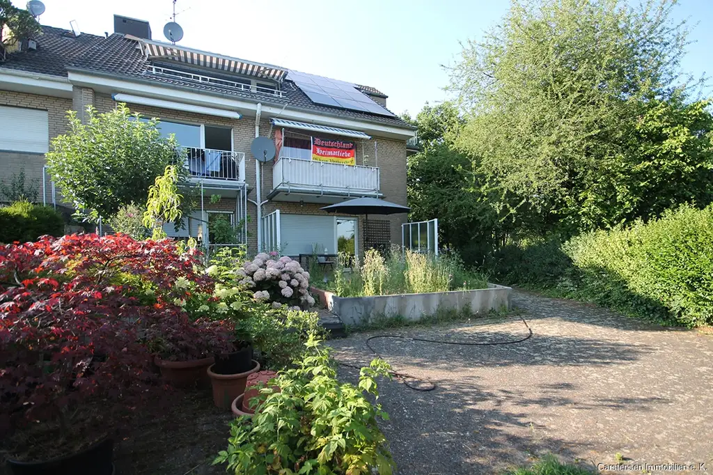VERMIETETES SOLIDES 5-PARTEIENHAUS ... BALKONE ... PV-ANLAGE