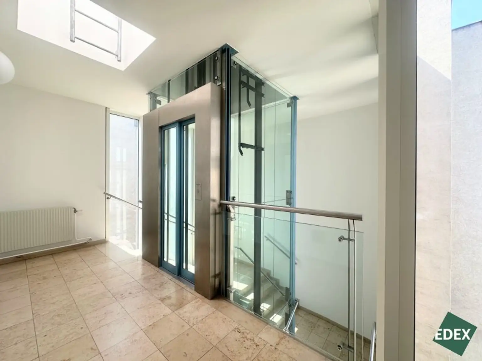Exklusive Innenstadt-Maisonette mit Glasfront, Freiflächen & Stephansdom-Blick