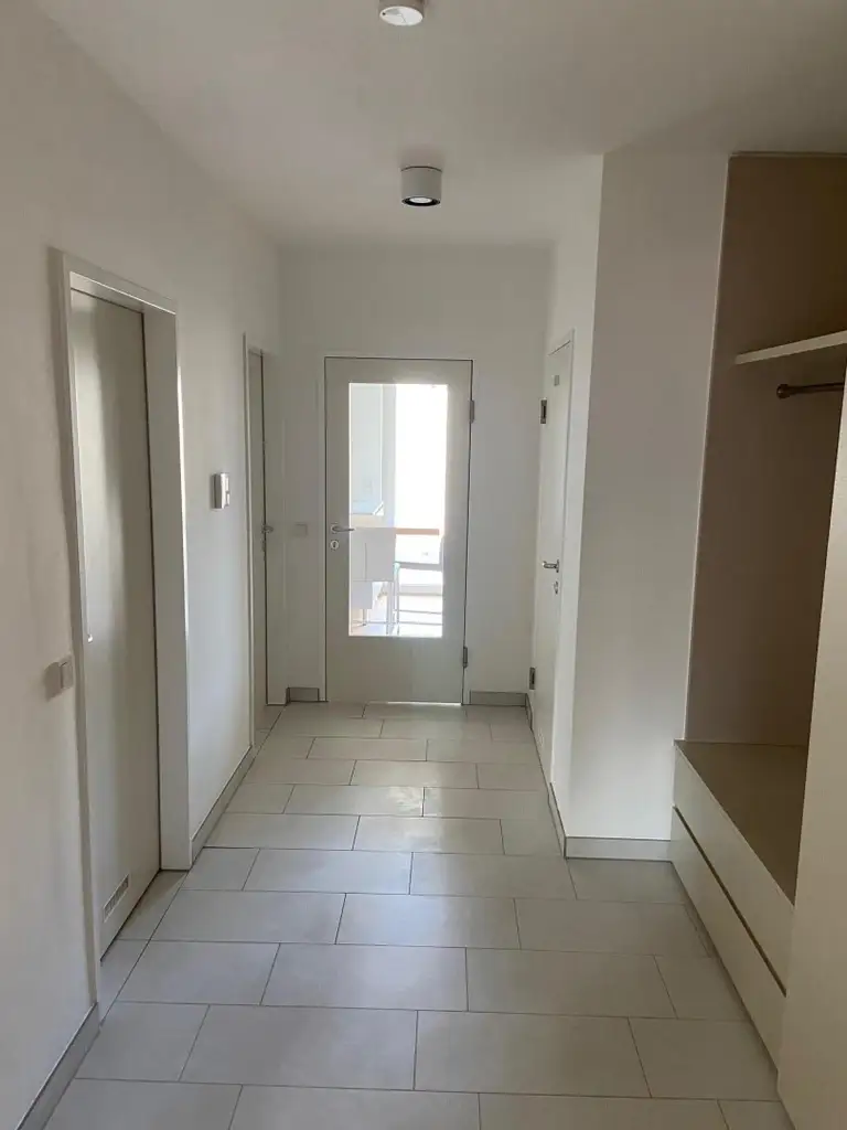 Moderne Neubauwohnung im Zentrum – mit Loggia u. Lift ! TIEFGARAGENPLATZ und KONTROLLIERTE WOHNRAUMBELÜFTUNG