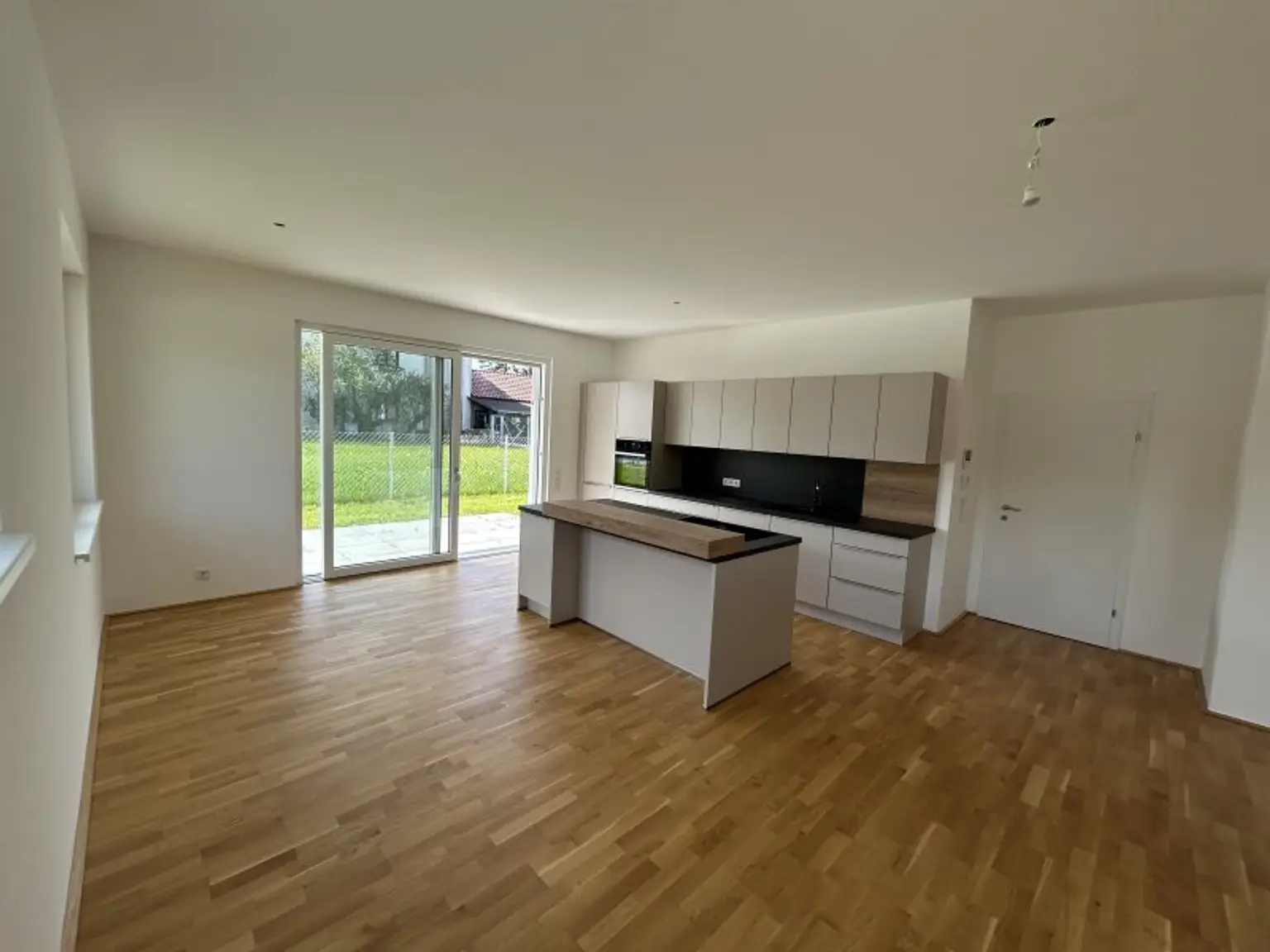 Perfekte Neubau Gartenwohnung | Steinhaus