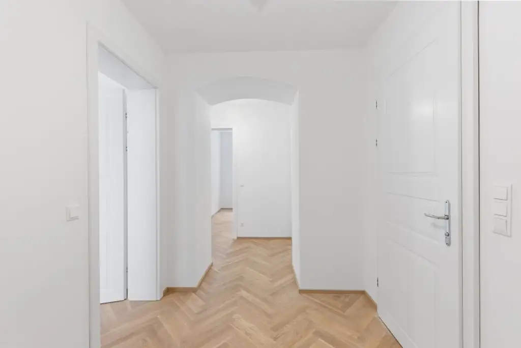 3-Zimmer-Altbaueigentumswohnung in generalsaniertem Altbau mit Terrasse und Garten