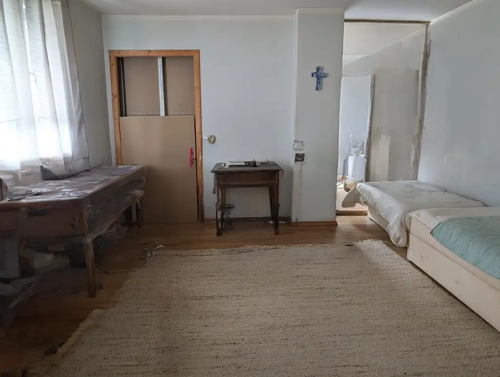 Sanierungsbedürftiger Bungalow mit großem Grundstück - in ruhiger, sonniger Lage