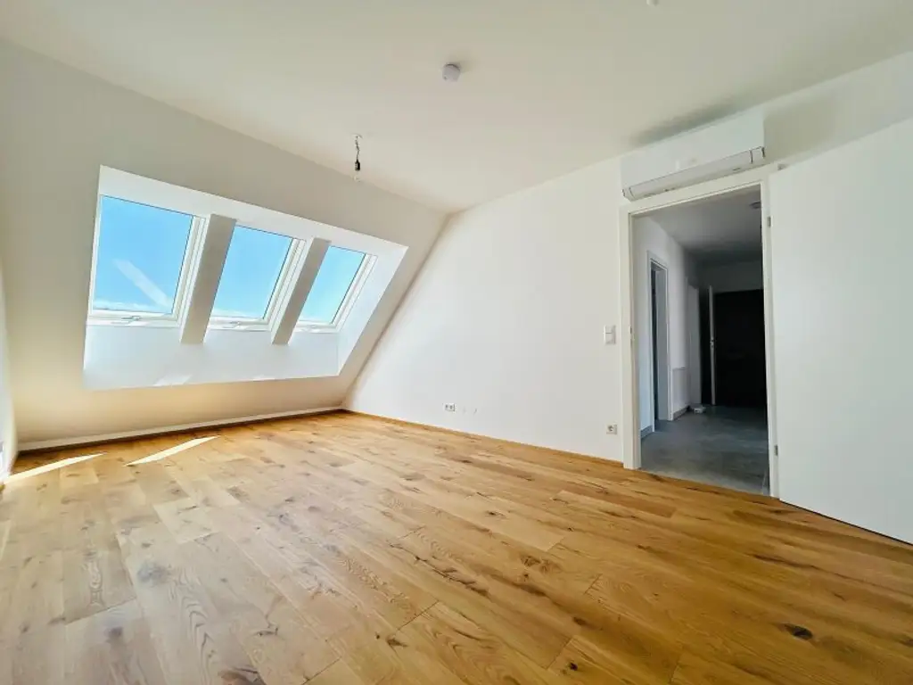 Provisionsfreie, klimatisierte Dachgeschosswohnung nahe der UNO-City – 2 Terrassen, Fitnessraum, PKW-Stellplatz – Erstbezug