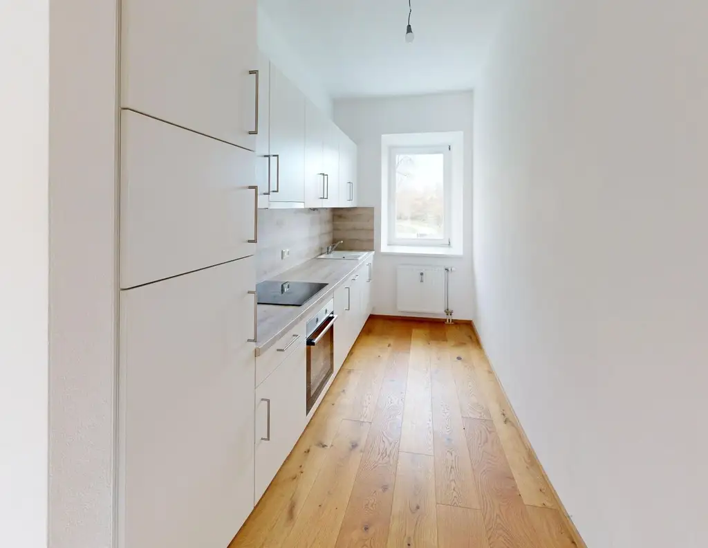 Provisionsfrei / Keine Grunderwerbsteuer!: Feldkirchen - 3-Zimmer-Wohnung im Grünen mit großem Balkon und Spielplatz
