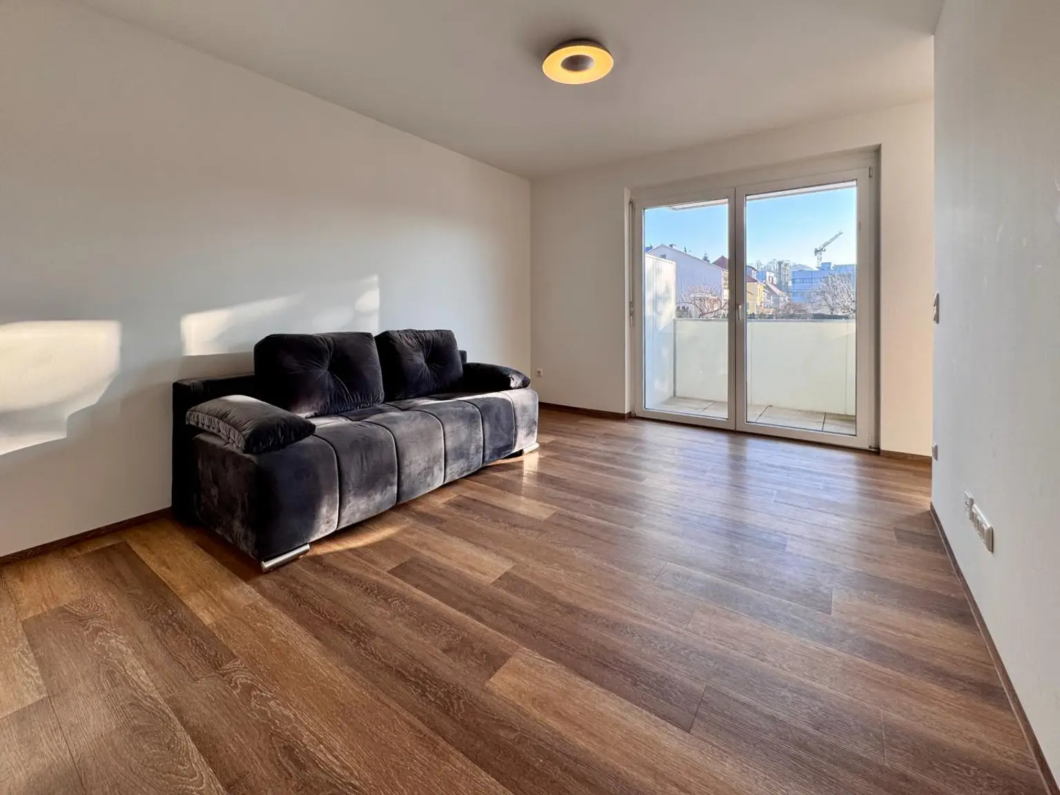 Wohnzimmer mit Schlafsofa