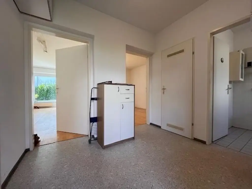 Tolle 2-Zimmer-Wohnung mit Eigengarten, Loggia und TG-Platz zu verkaufen