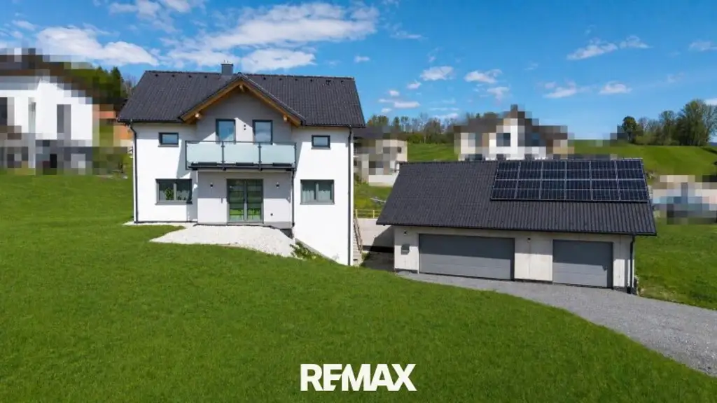 Modernes Niedrigenergie-Einfamilienhaus mit Garten und sonniger Terrasse – ideal für Familien!
