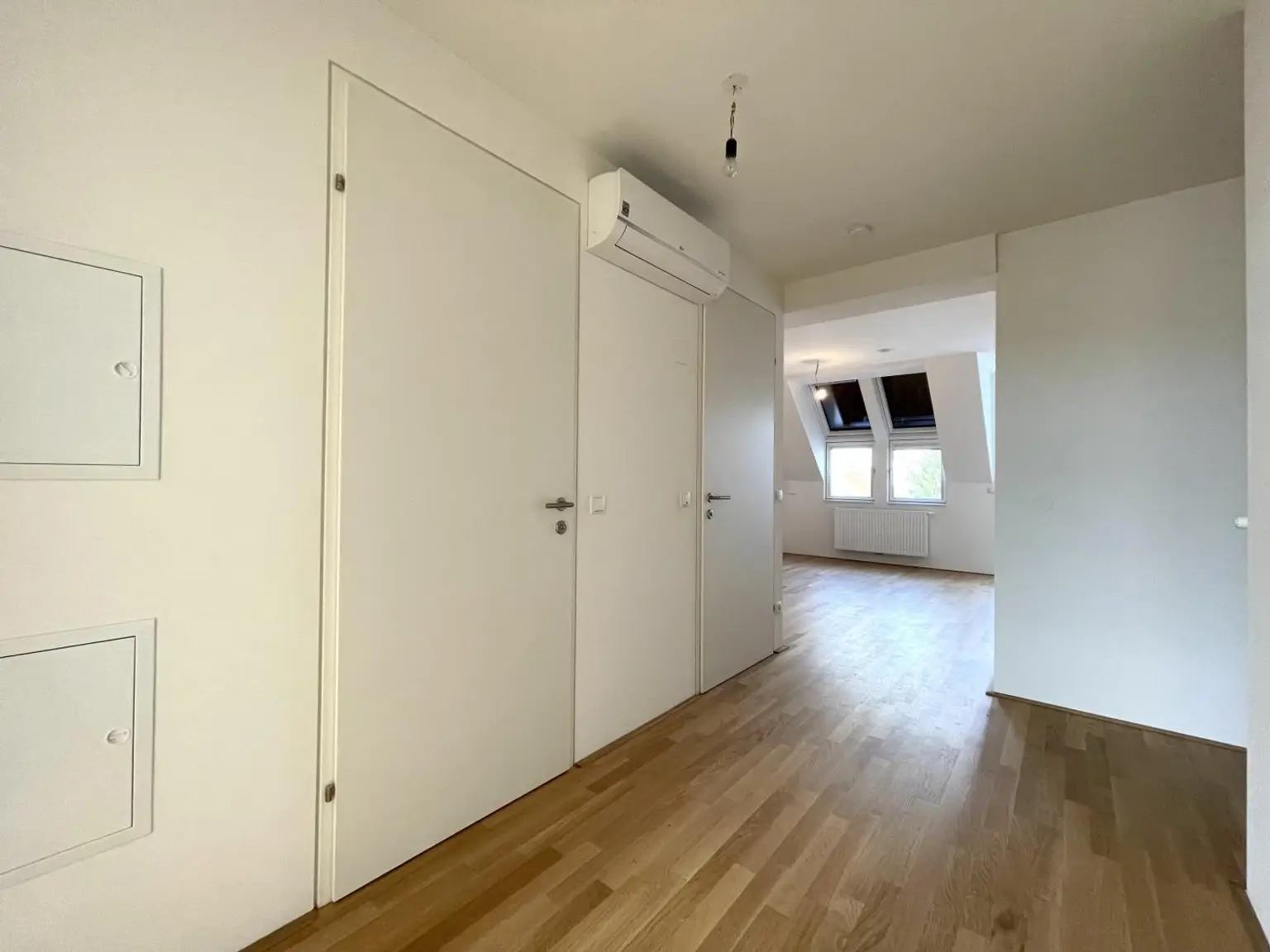 Klimatisierte Neubauwohnung mit hofseitigem Balkon im Dachgeschoss!!!
